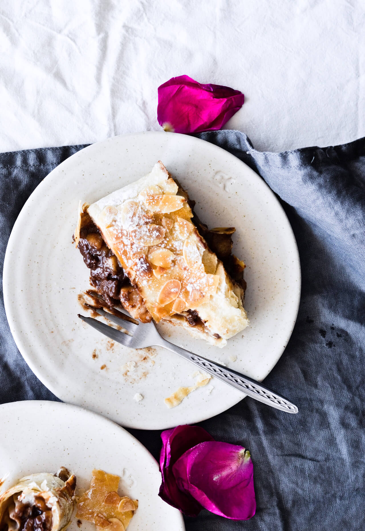 Easy chocolate pear strudel with cinnamon and almond flavor makes the perfect holiday dessert! Great warm or cold, made easily with phyllo pastry. Quick dessert!