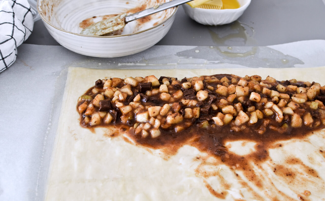 Easy chocolate pear strudel with cinnamon and almond flavor makes the perfect holiday dessert! Great warm or cold, made easily with phyllo pastry. Quick dessert!