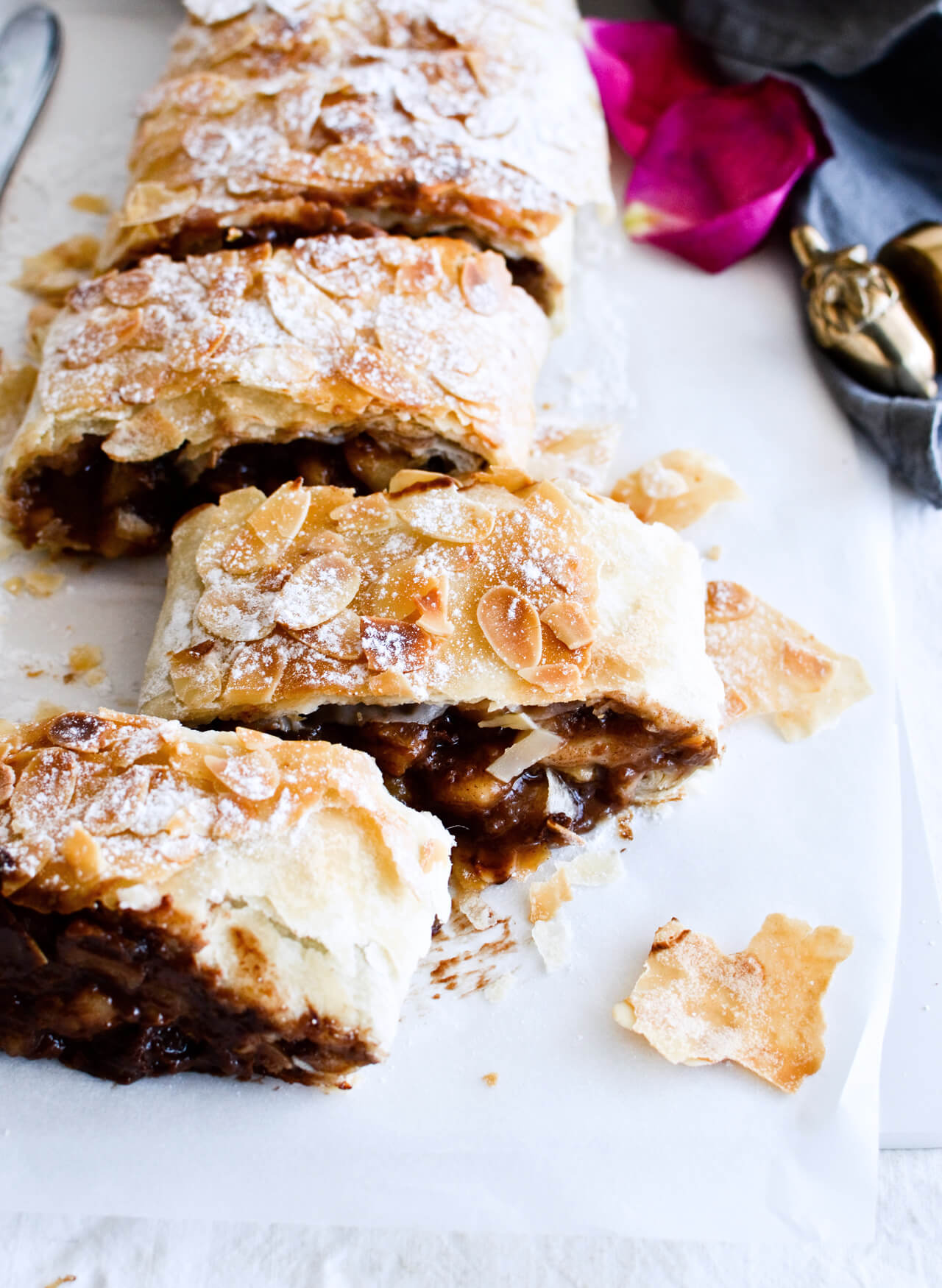 Easy chocolate pear strudel with cinnamon and almond flavor makes the perfect holiday dessert! Great warm or cold, made easily with phyllo pastry. Quick dessert!