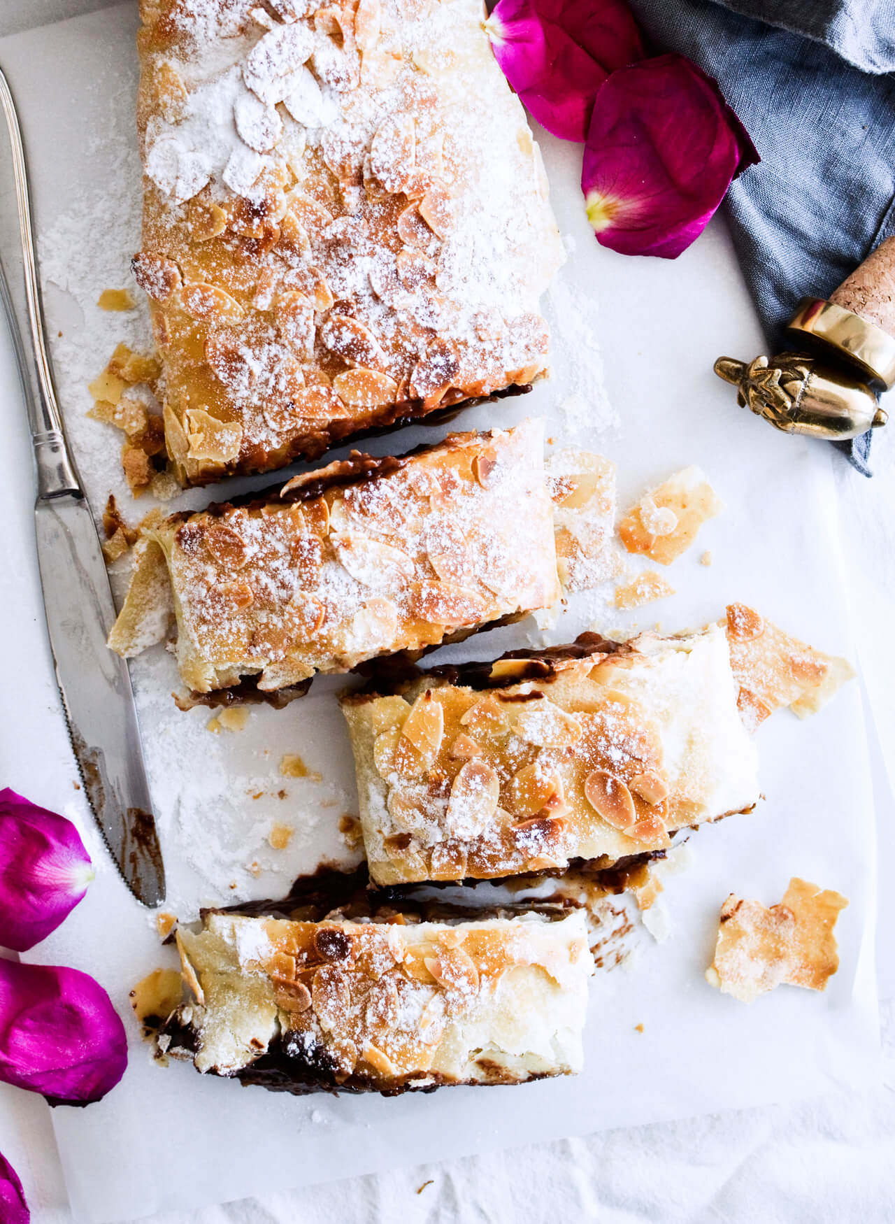 Easy chocolate pear strudel with cinnamon and almond flavor makes the perfect holiday dessert! Great warm or cold, made easily with phyllo pastry. Quick dessert! 