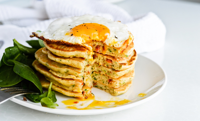 savory pancakes with herbs and fried egg