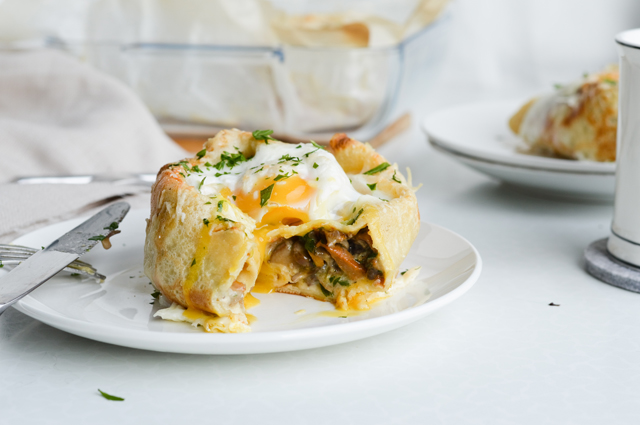 Savory crepes with mushroom ragout and eggs - an amazing brunch recipe that people fight over! So good and fairly easy to make. A great vegetarin main dish too.
