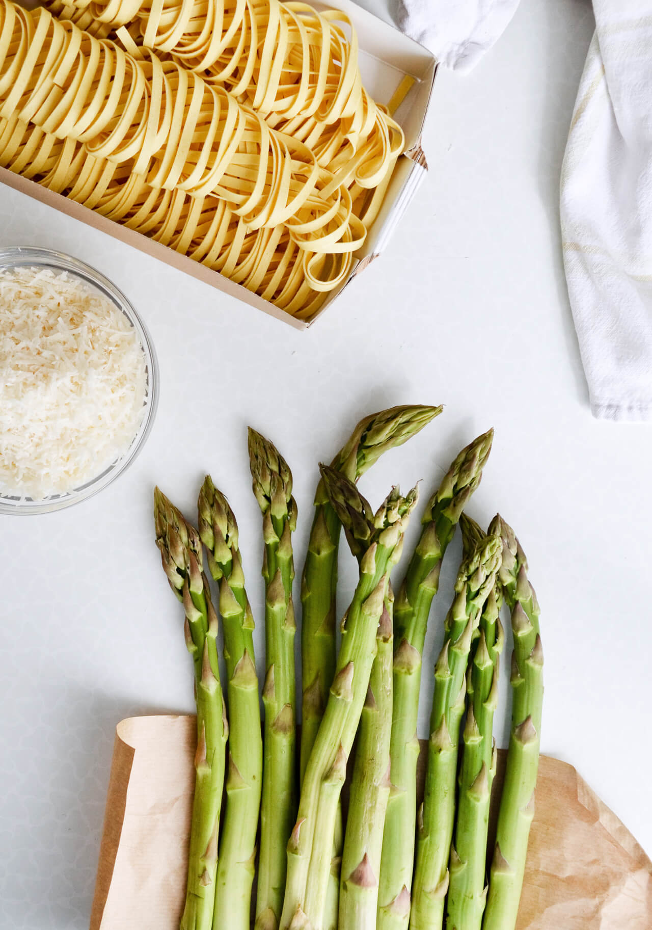Creamy asparagus tagliatelle with poached eggs - a quick and wonderful asparagus dinner.