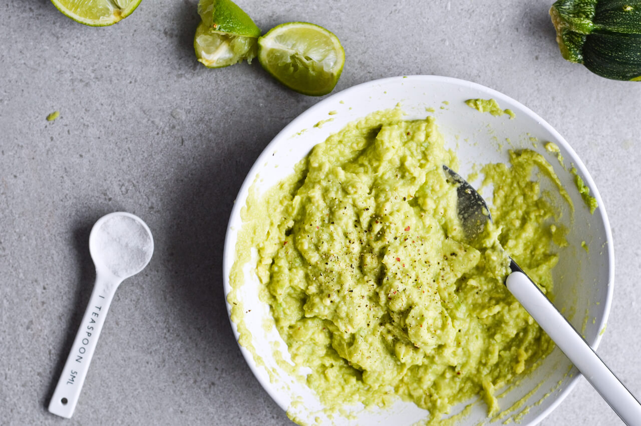 Guacamole cabbage bean tacos are the best vegetarian tacos! With easy homemade guacamole, zesty cabbage, zucchini, paprika beans and lots of cheddar! | sugarsalted.com