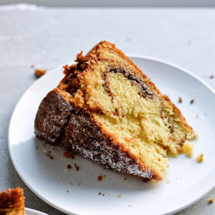 Recipe for sour cream cinnamon coffee cake, fluffy and filled with cinnamon sugar syrup. Inspired by Gilmore girls.