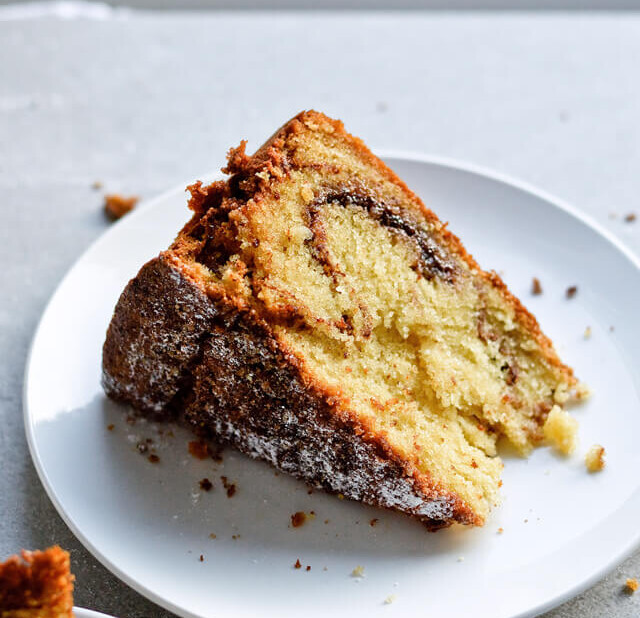 Recipe for sour cream cinnamon coffee cake, fluffy and filled with cinnamon sugar syrup. Inspired by Gilmore girls.