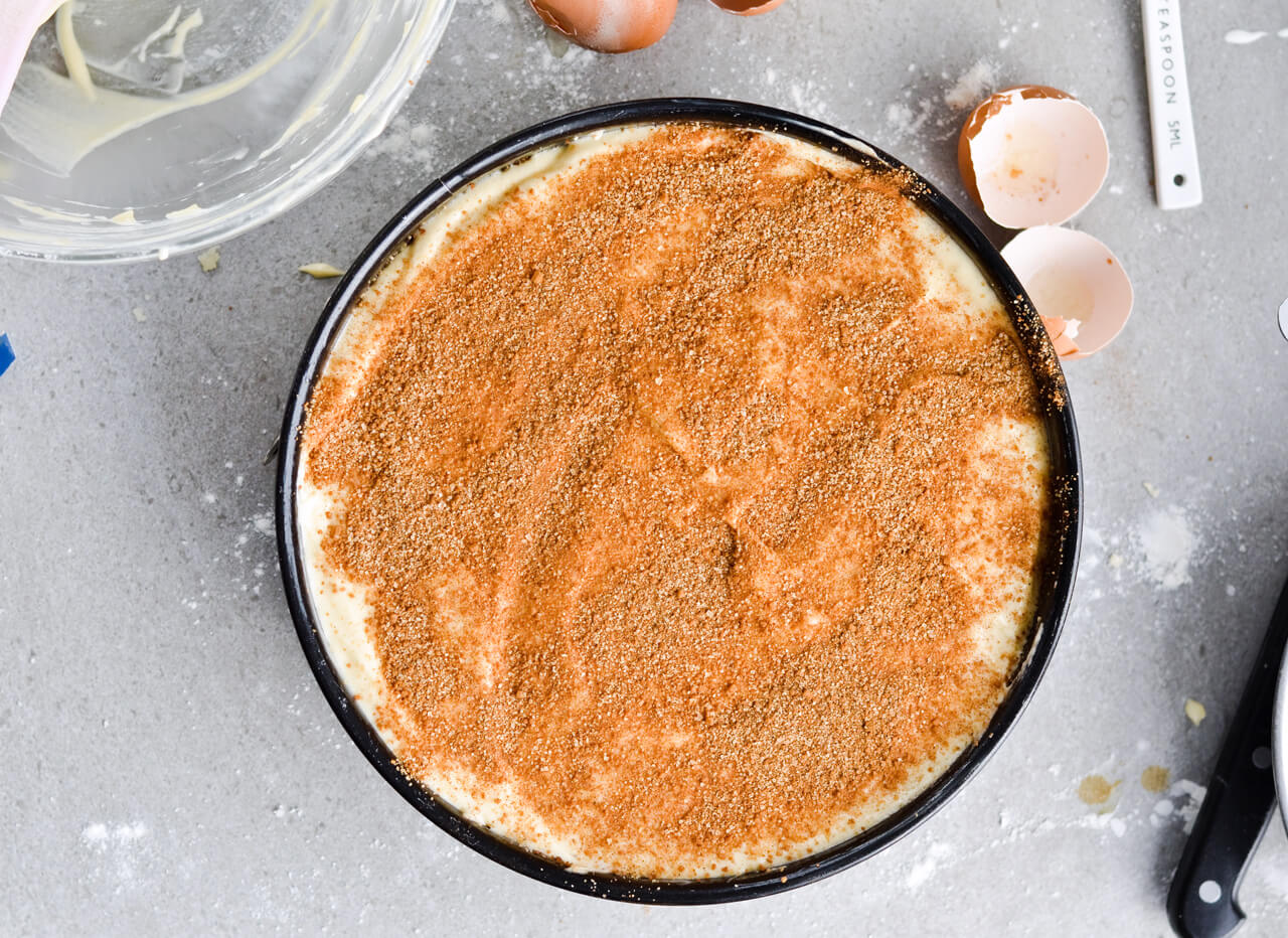 coffee cake sprinkled with cinnamon sugar before baking 