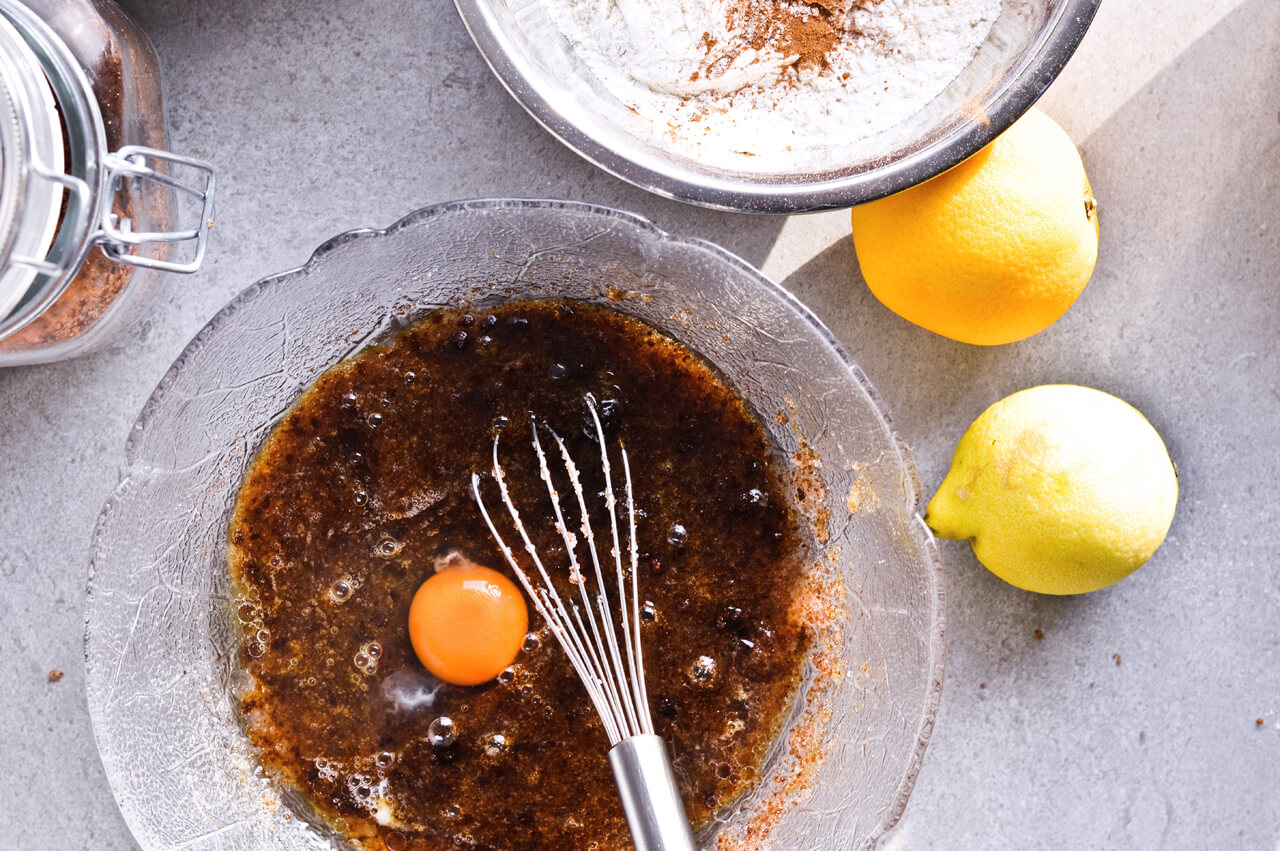 Recipe for Citrus pistachio spice cake with lemon sugar glaze, cranberry compote and homemade whipped cream. Full of cinnamon and cardamom, it almost tastes like lebkuchen. Perfect holiday treat, can be made ahead. | sugarsalted.com