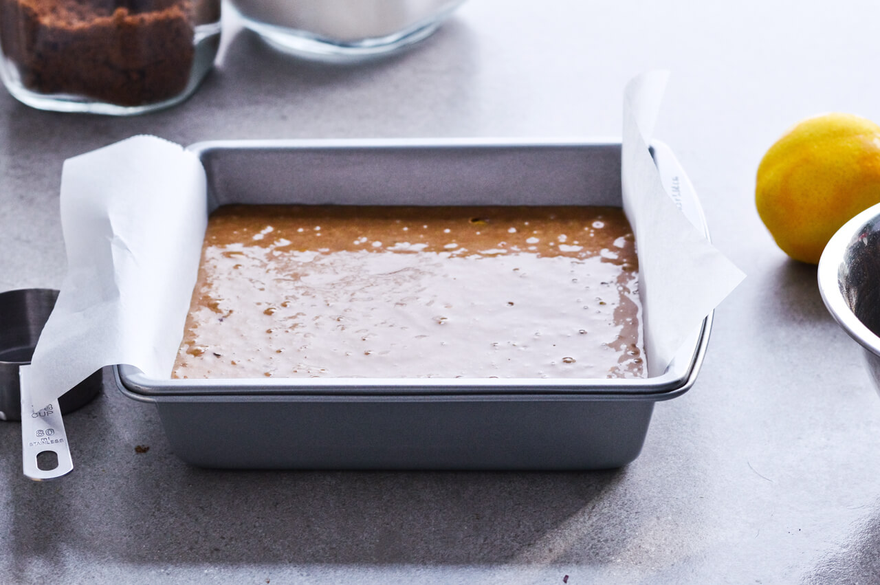 Recipe for Citrus pistachio spice cake with lemon sugar glaze, cranberry compote and homemade whipped cream. Full of cinnamon and cardamom, it almost tastes like lebkuchen. Perfect holiday treat, can be made ahead. | sugarsalted.com
