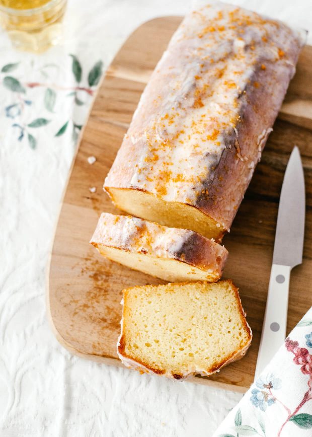 sliced loaf cake on wood board
