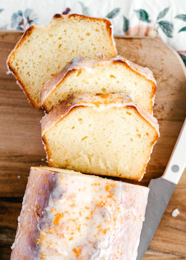 winter citrus yogurt loaf cake with sugar glaze, sliced