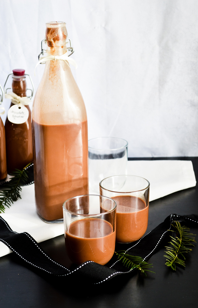 Make homemade chocolate liqueur for the holidays and give as Christmas gifts! A sweet, decadent drink.