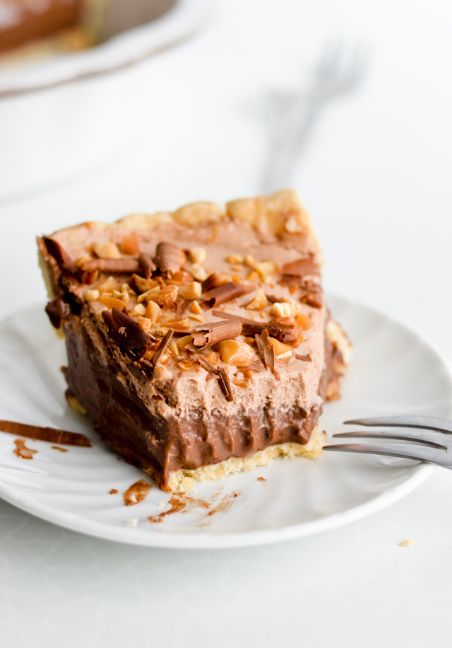 Chocolate pudding pie with nutella cream and peanuts 