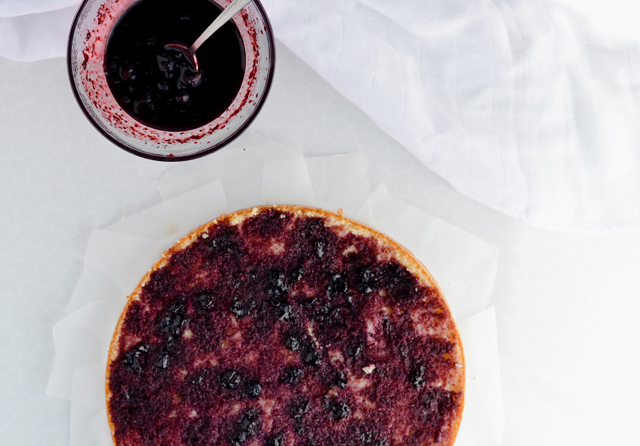 cake layer with blueberry sauce