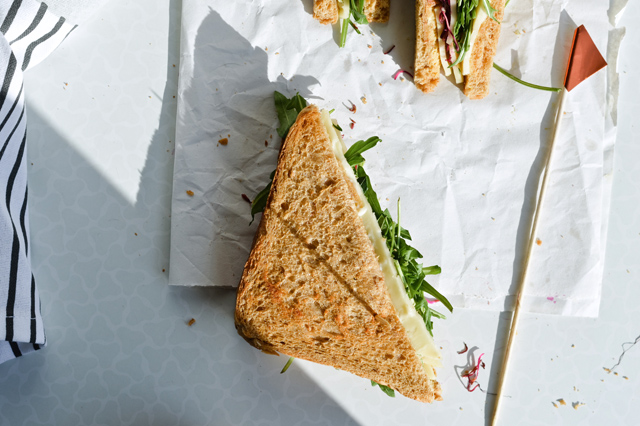 This cheese mustard veggie sandwich is a perfect quick lunch. Made with beet sprouts, arugula, wonderful cheese and much more.