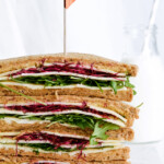 This cheese mustard veggie sandwich is a perfect quick lunch. Made with beet sprouts, arugula, wonderful cheese and much more.