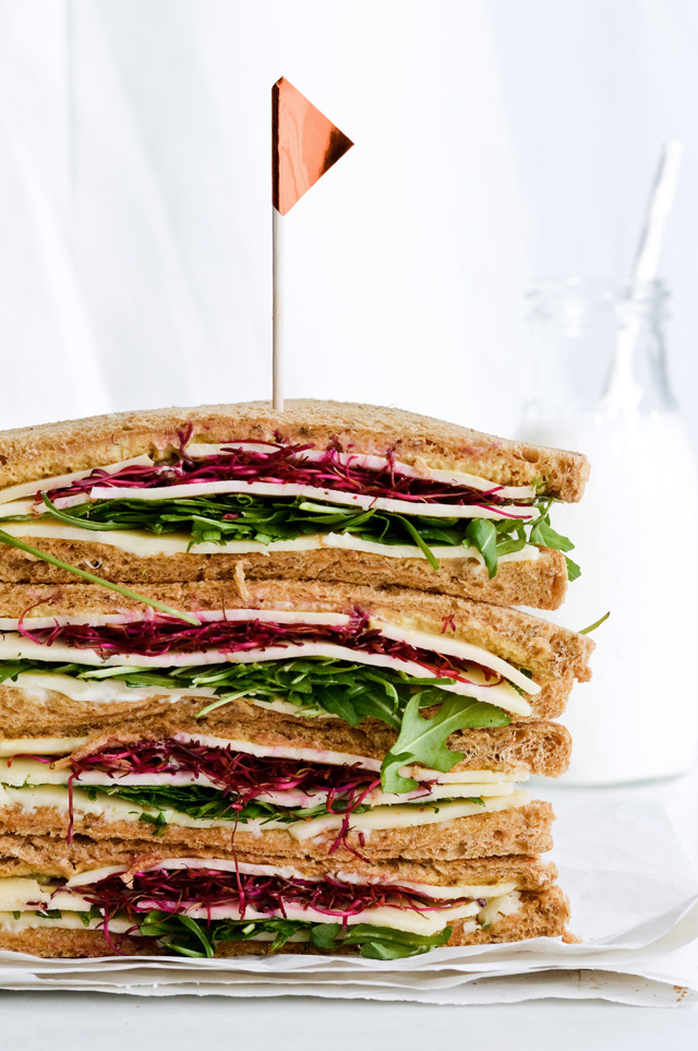 This cheese mustard veggie sandwich is a perfect quick lunch. Made with beet sprouts, arugula, wonderful cheese and much more. 