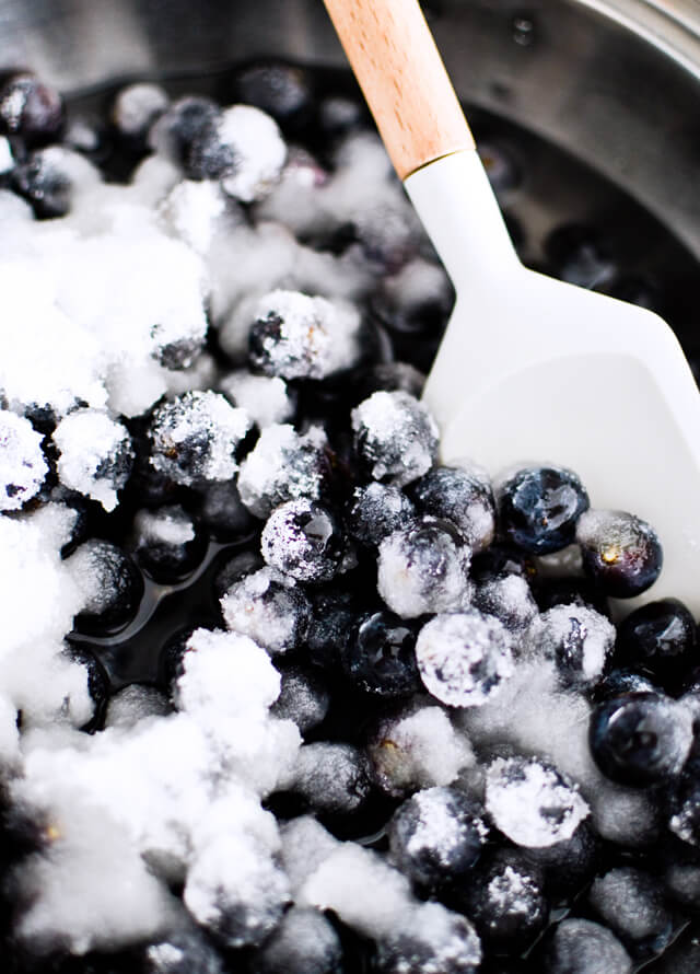 Concord grape syrup ginger beer floats will make you feel like a child again! Made with easy homemade syrup and lots of vanilla ice cream, these make the perfect early Fall - Autumn treat.