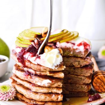 Recipe for shredded pear pancakes with yogurt and honey! Perfect Fall brunch recipe that makes fluffy, fruity pancakes everyone can enjoy.