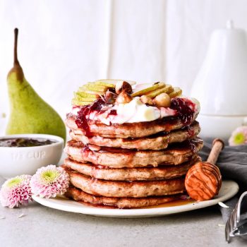 Recipe for shredded pear pancakes with yogurt and honey! Perfect Fall brunch recipe that makes fluffy, fruity pancakes everyone can enjoy.