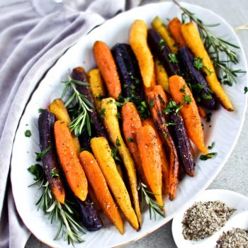 Recipe for simple herb roasted carrots - rainbow carrots baked in pan