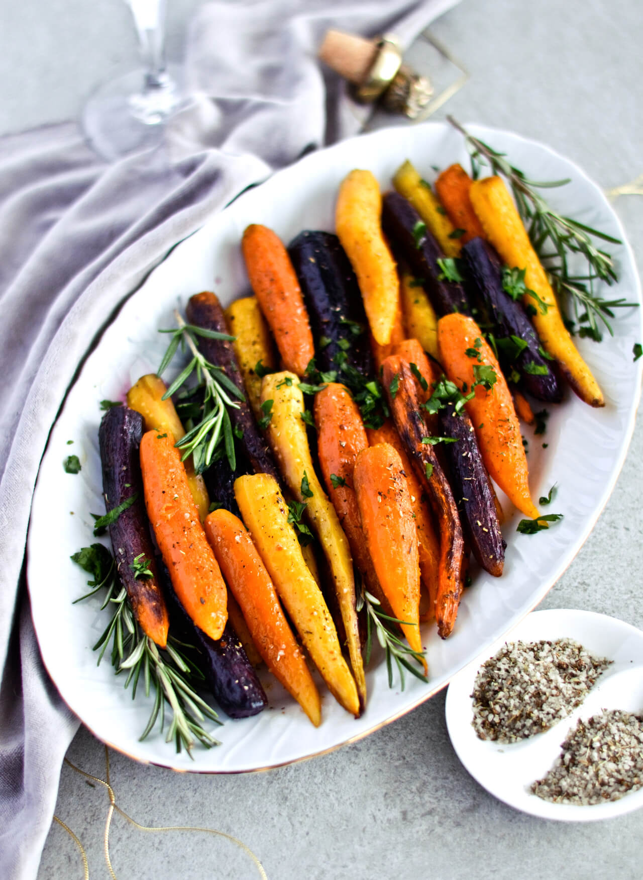 Recipe for simple herb roasted carrots - rainbow carrots baked in pan