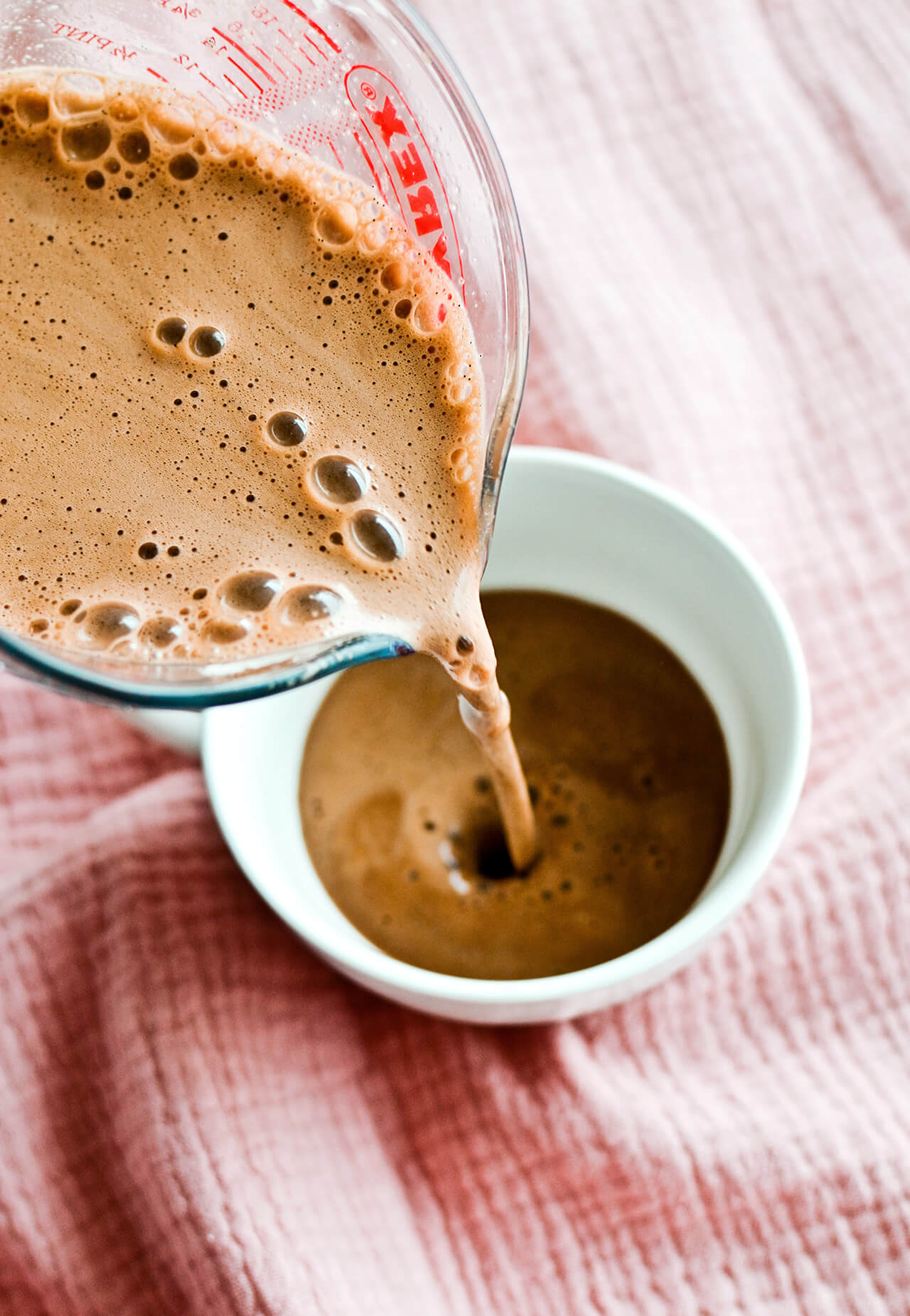 Add protein powder to coffee and make this hot chocolate protein coffee. Gives you a boost of energy and makes a perfect breakfast or snack addition.