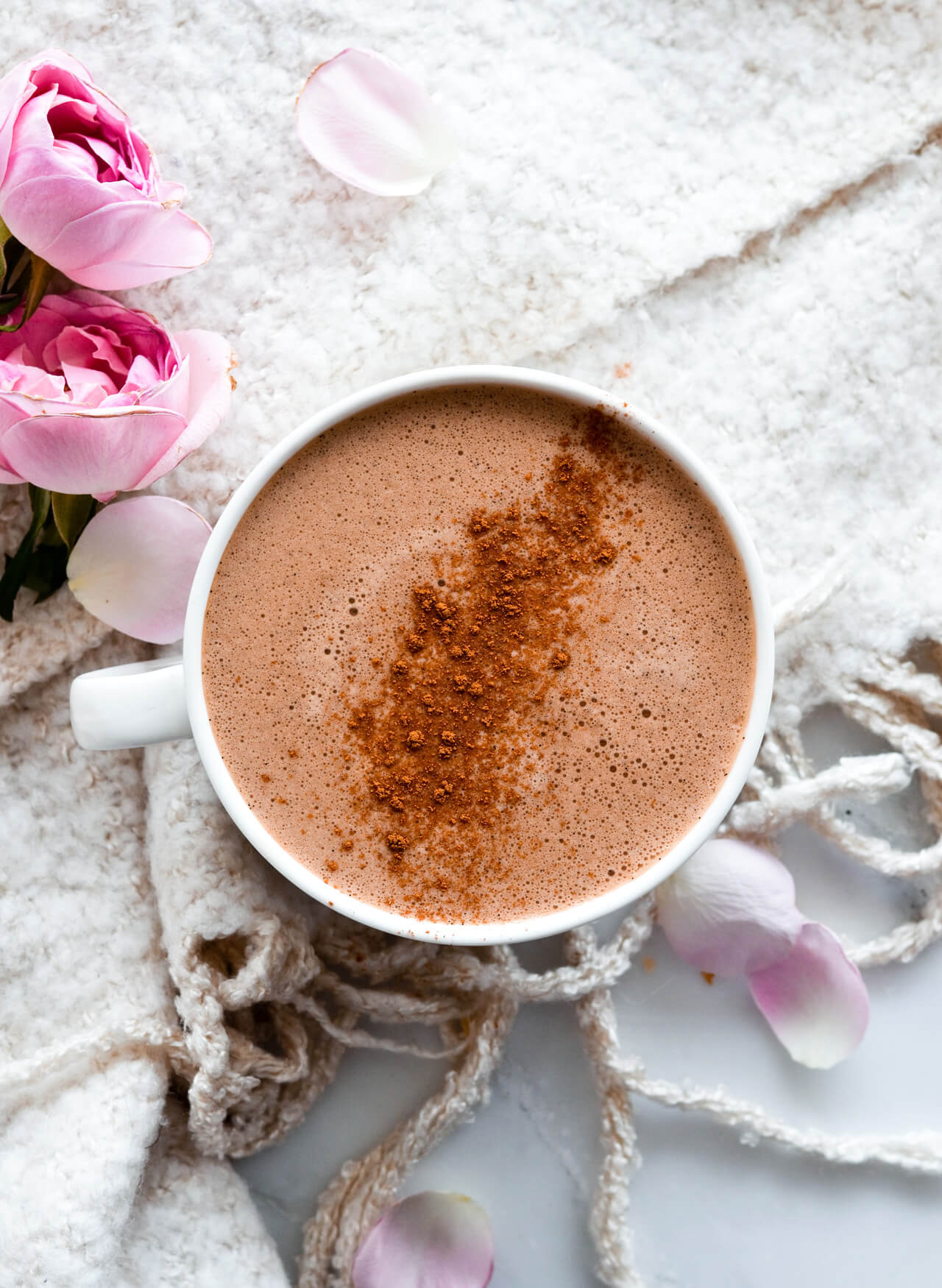 Add protein powder to coffee and make this hot chocolate protein coffee. Gives you a boost of energy and makes a perfect breakfast or snack addition.