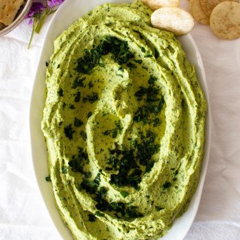 Recipe for simple parsley hummus, a fresh twist on a classic favorite, perfect dip for entertaining, spread for sandwiches or addition to dinner.
