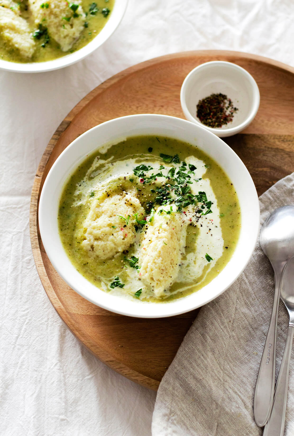 Vegan creamy broccoli soup with semolina dumplings is the perfect meal for cold weather! Done in under 60 minutes!