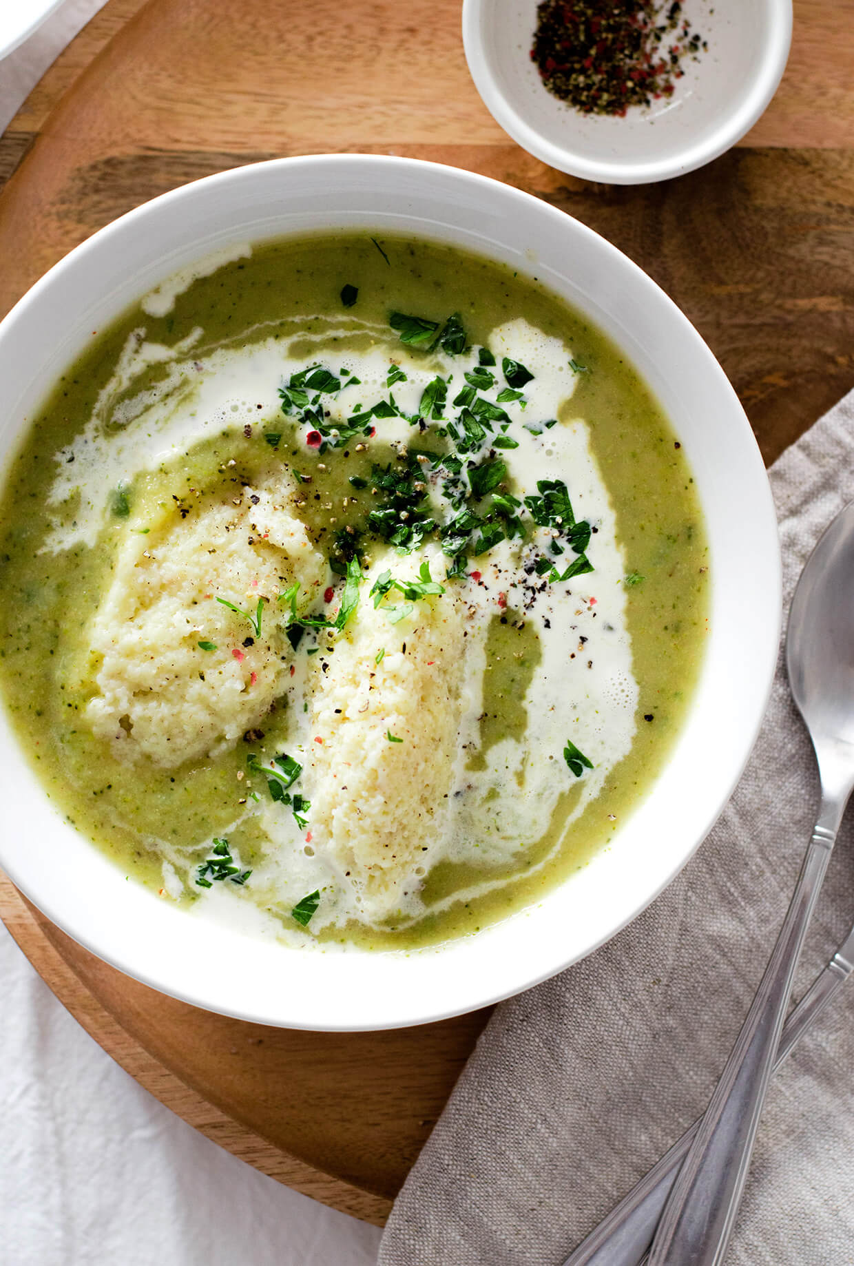 Vegan creamy broccoli soup with semolina dumplings is the perfect meal for cold weather! Done in under 60 minutes!