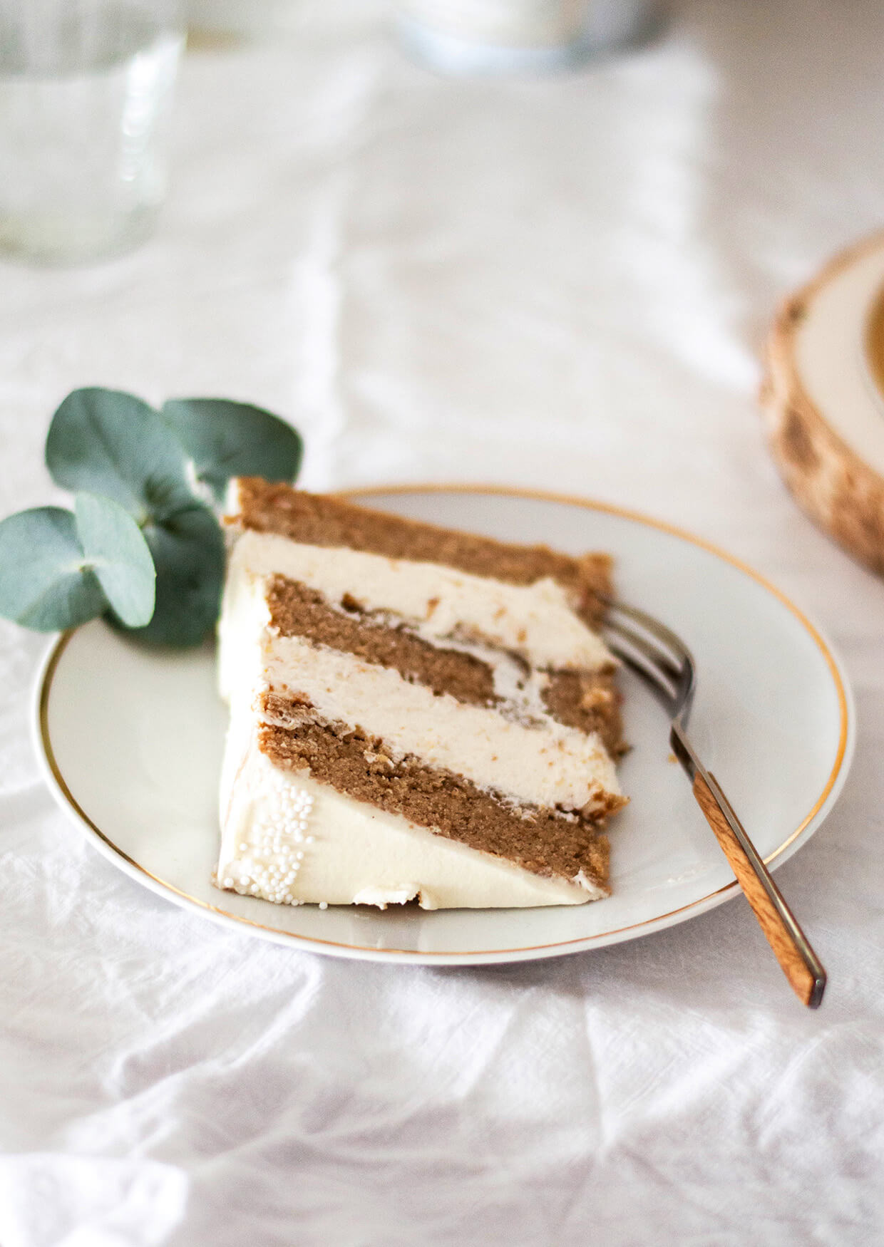 a slice of apple cider cake on a plate