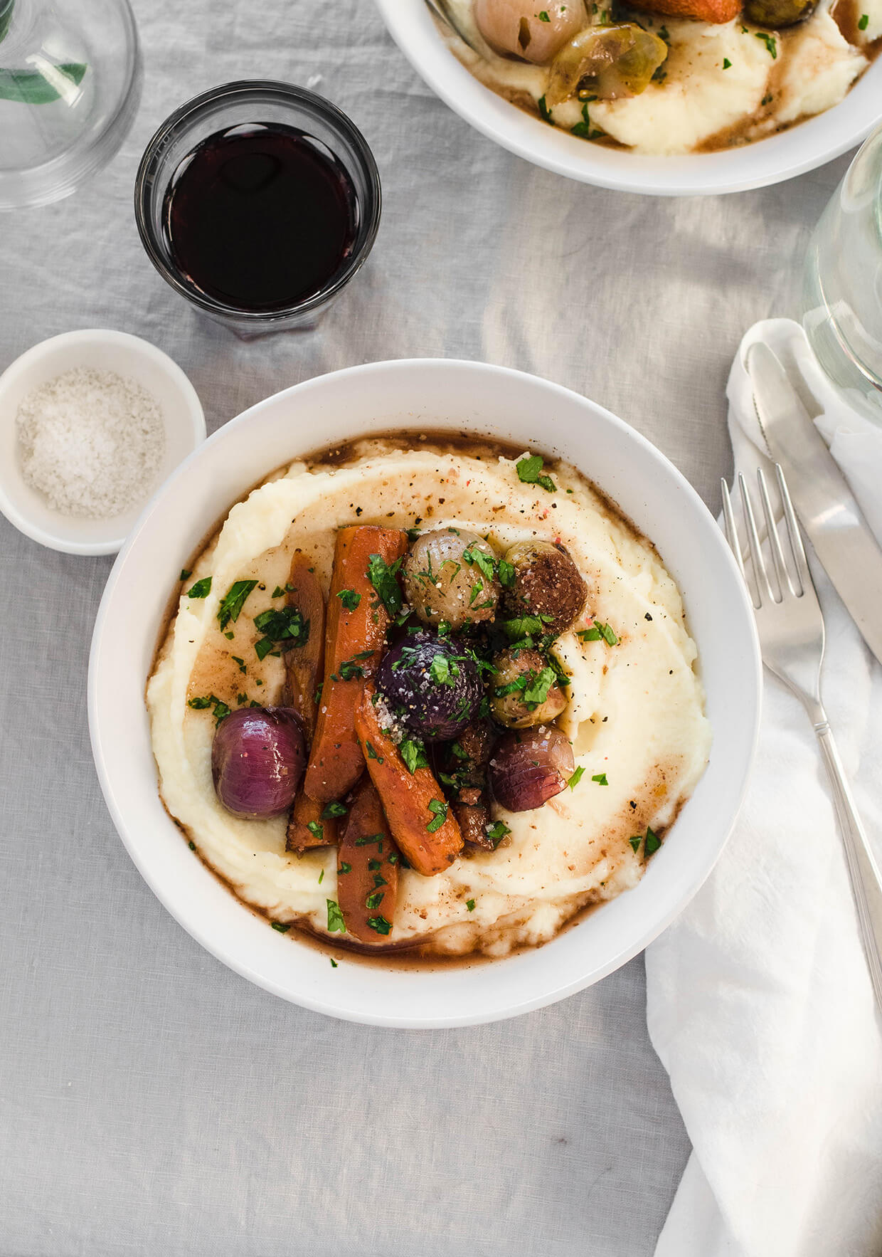 Learn how to make vegetarian brussels sprout carrot osso buco - a vegetarian take on an Italian classic dish. Packed with flavor and healthy vegetables!