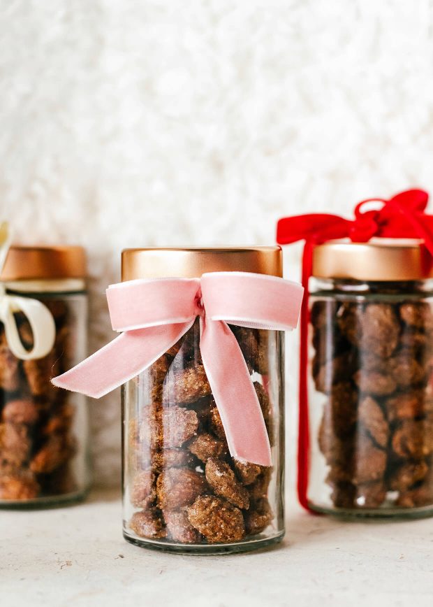 roasted almonds with cinnamon, stored in glass jars