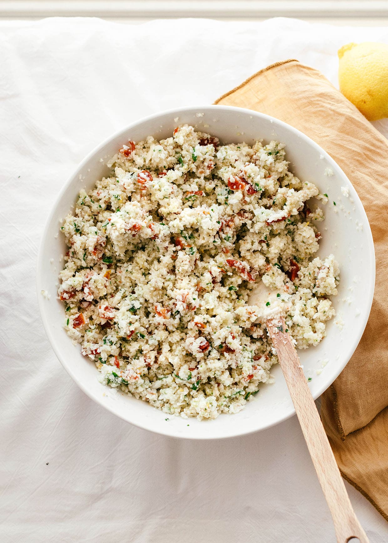 mixed raw cauliflower pesto in a bowl