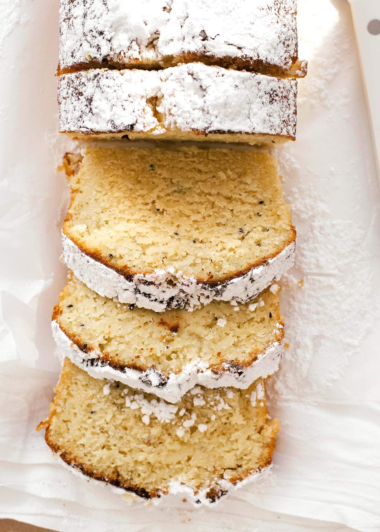 slices of pound cake dusted with powdered sugar