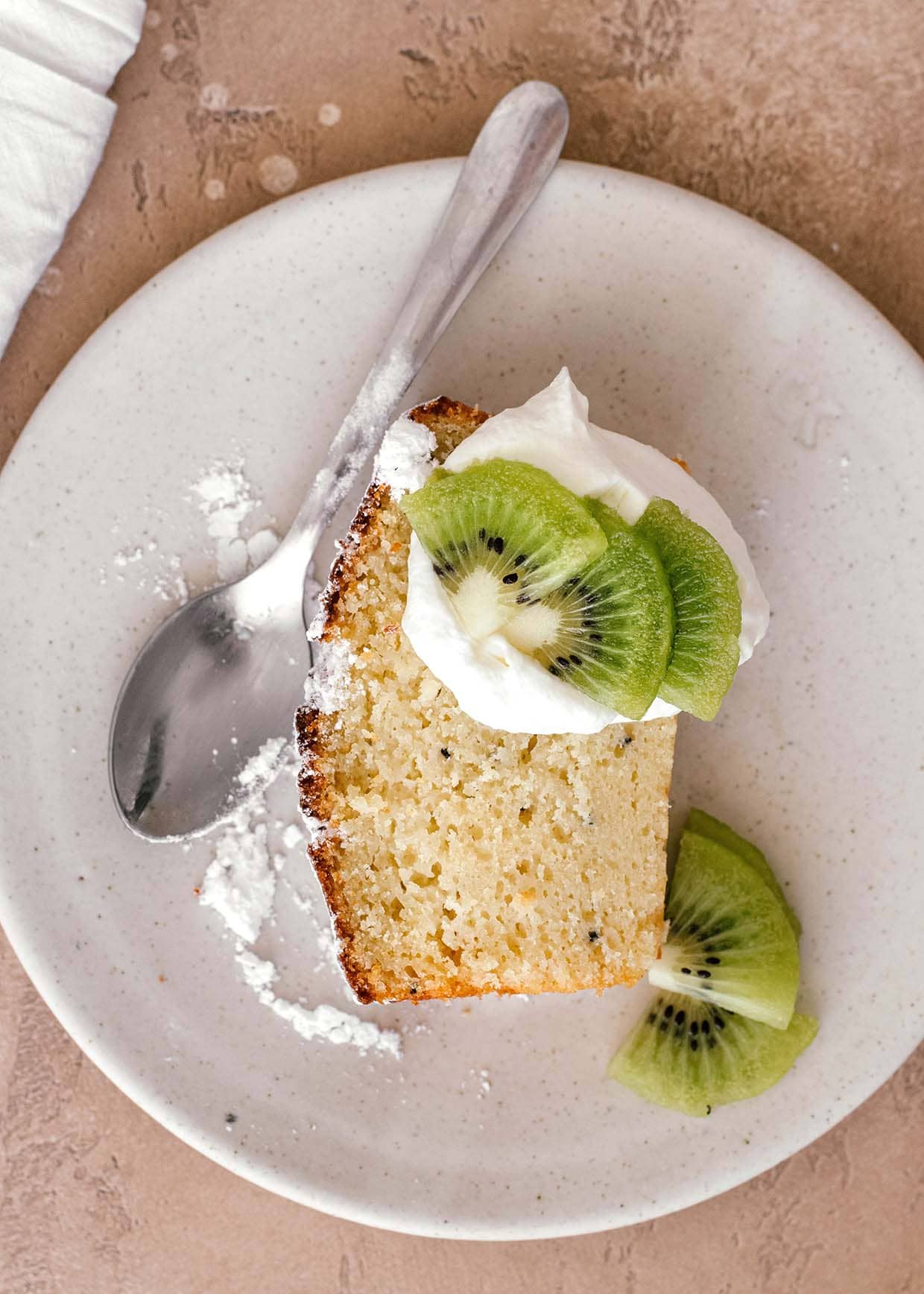 kiwi lime loaf cake with yogurt served on plate