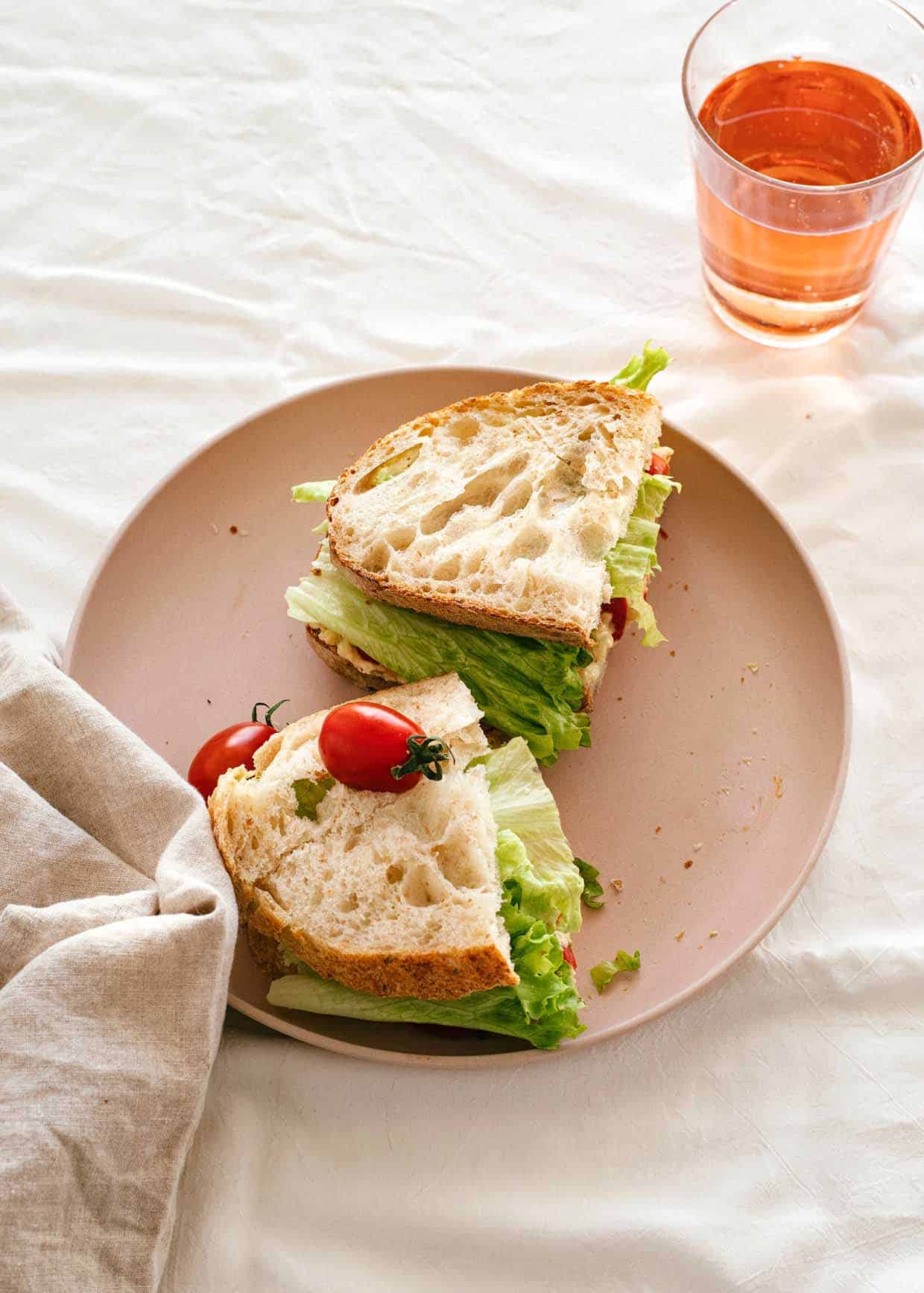 sandwich with fresh lettuce and chickpea tuna spread