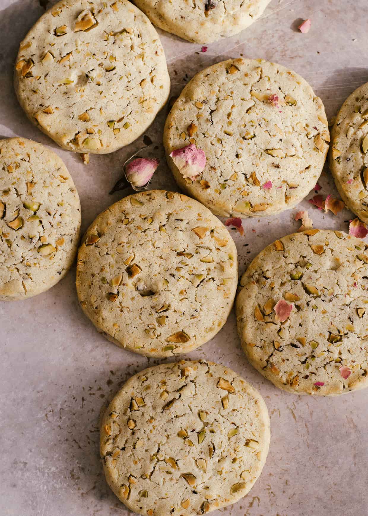 pistachio cookies baked placed on a sheet