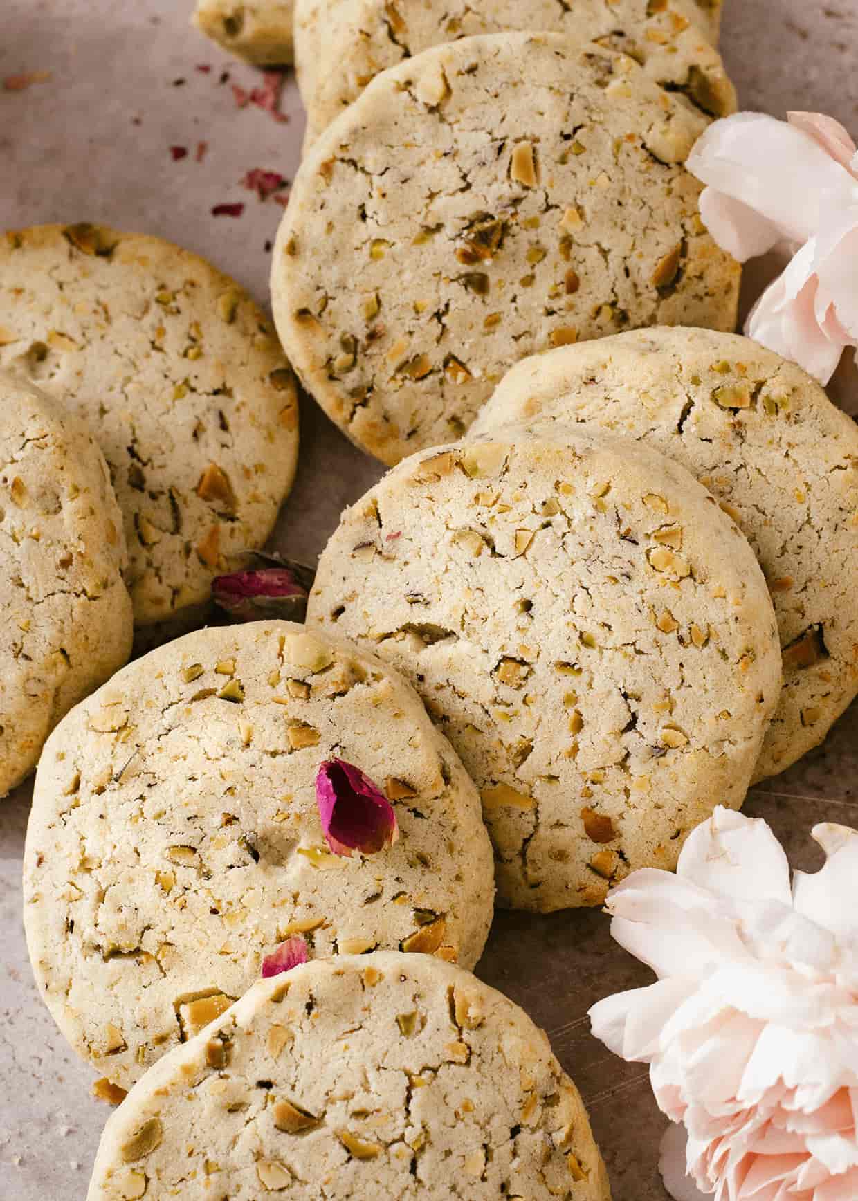 pistachio cookied stacked on a table
