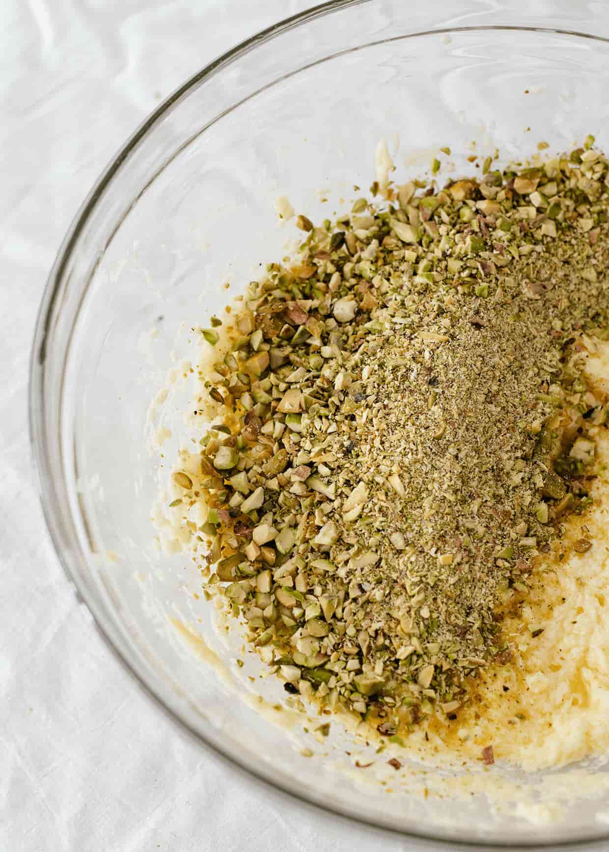 small green chunks of chopped pistachio nuts