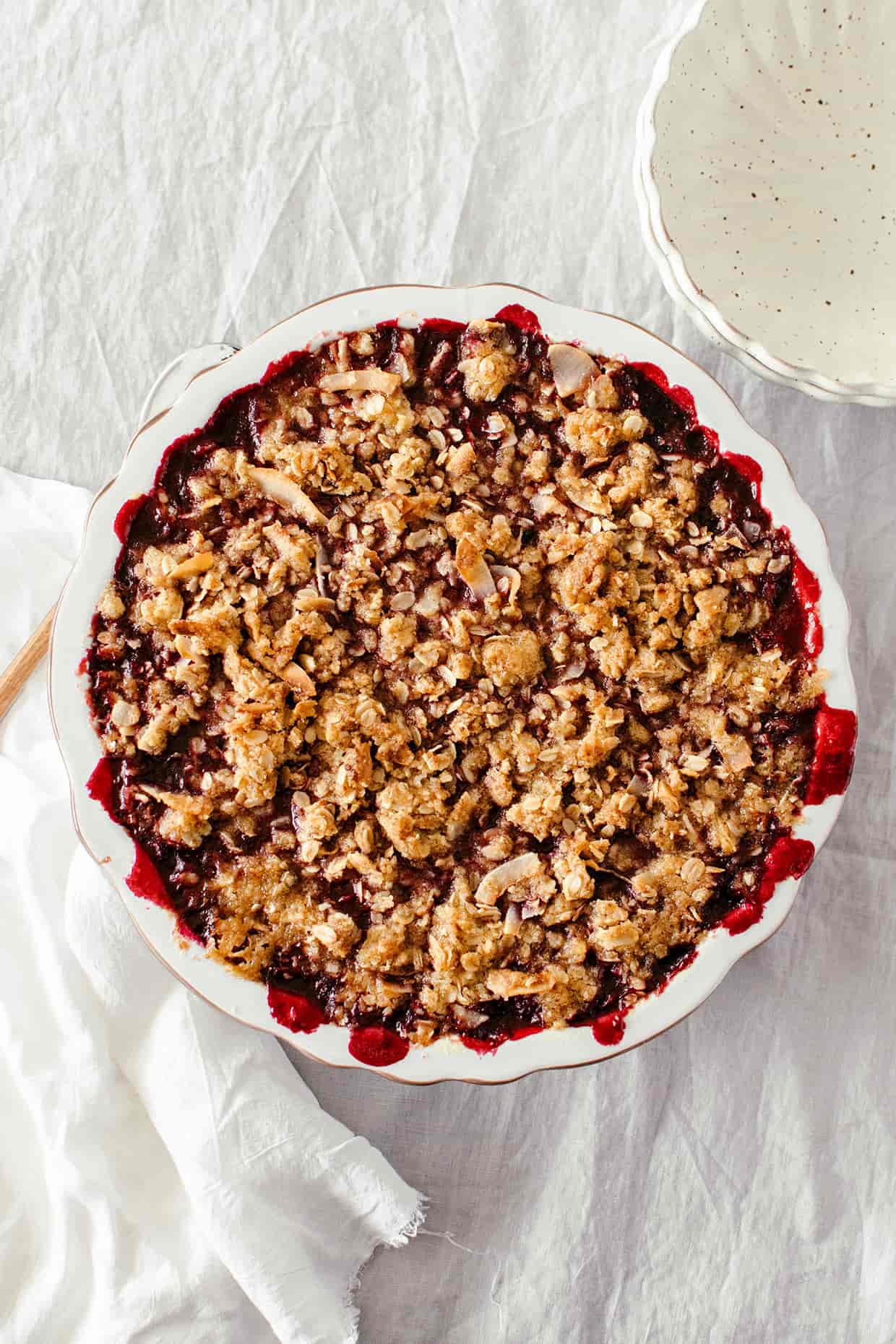 baked fruit crisp in a round pie dish