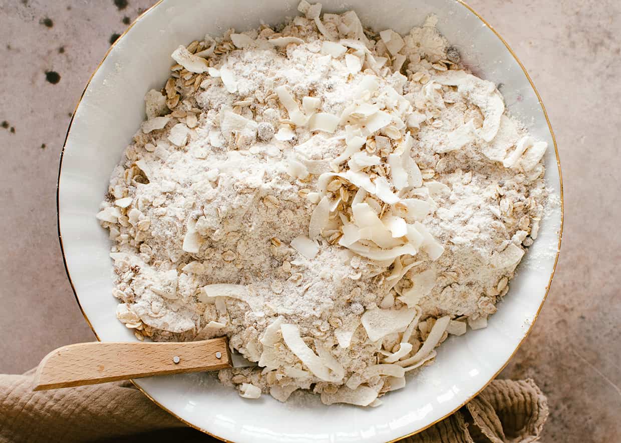 a mixture of oats, flour and sugar in a bowl