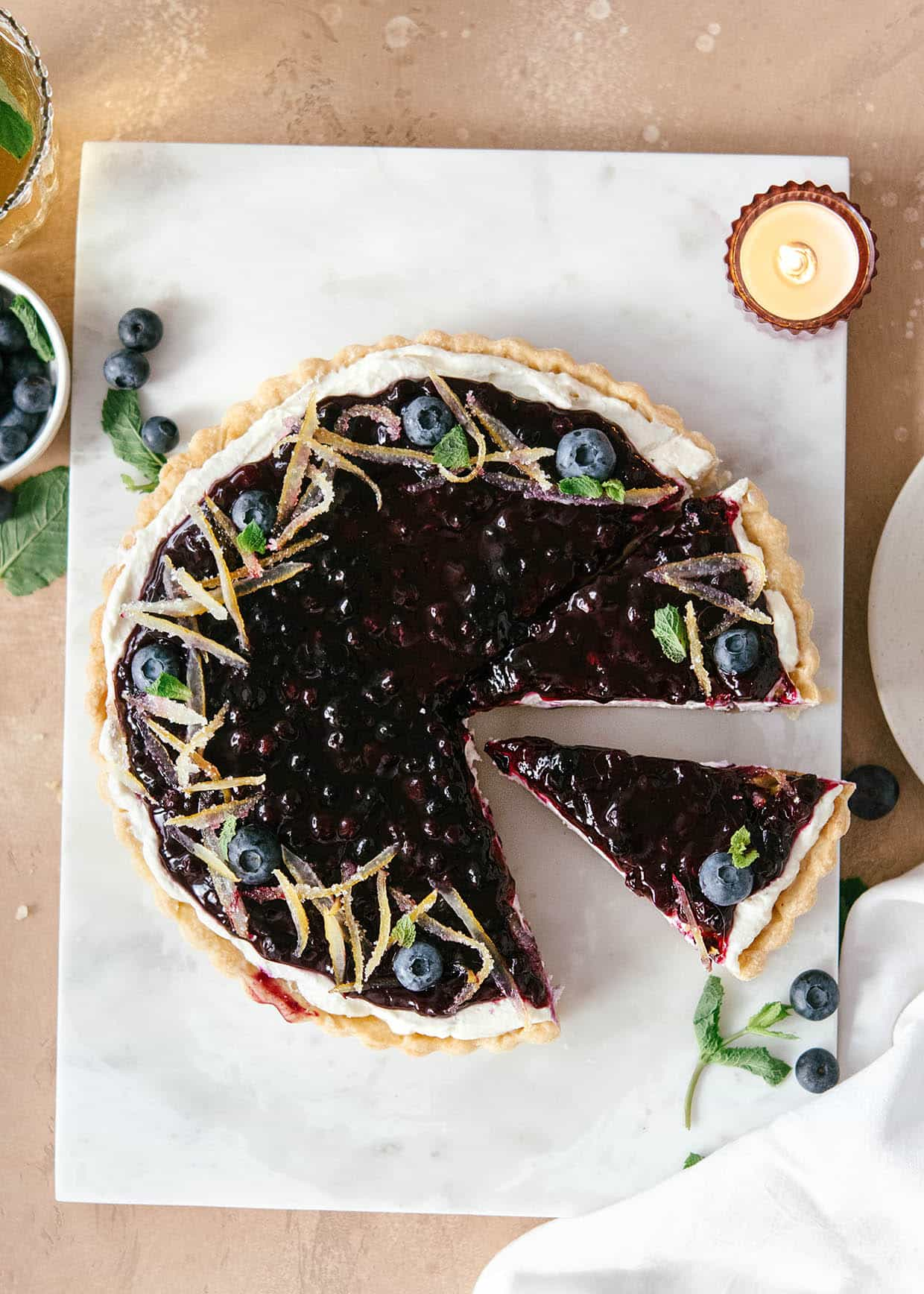 top view of sliced blueberry cream pie