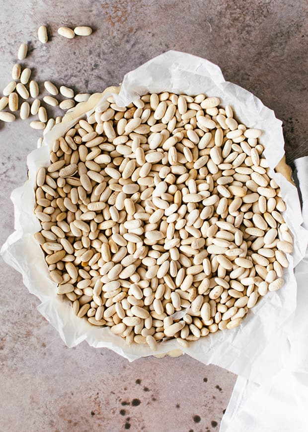 tart shell filled with baking beans