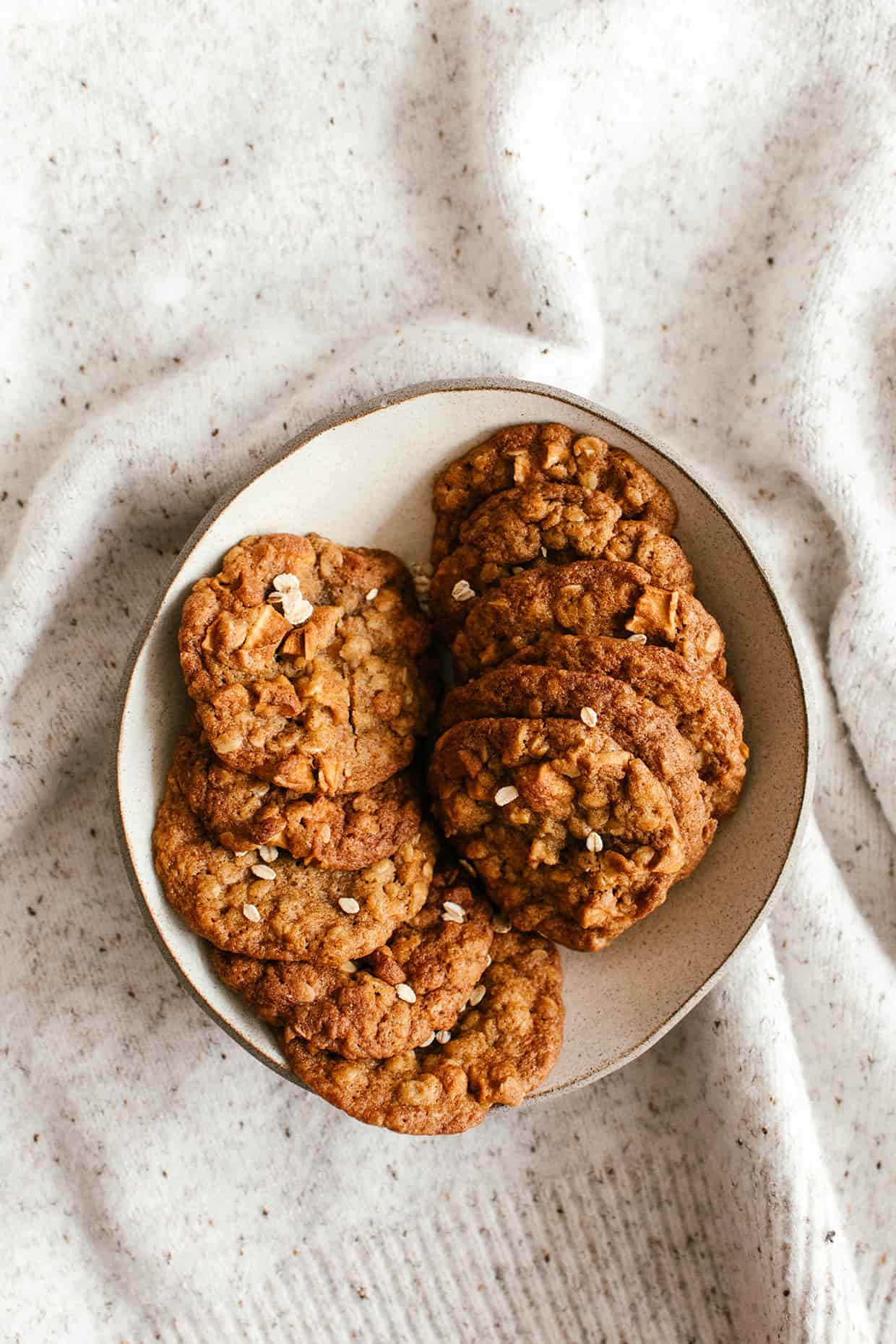 chunky apple soft oatmeal cookies in a bowl