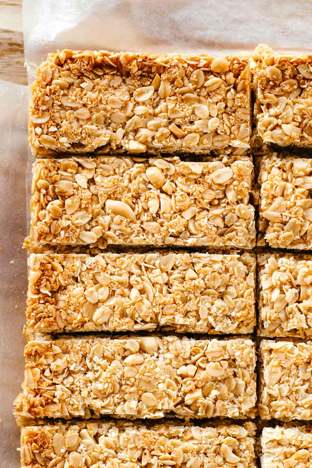 baked homemade granola bars sliced on a baking sheet