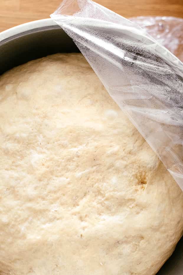 raw brioche dough in a bowl 