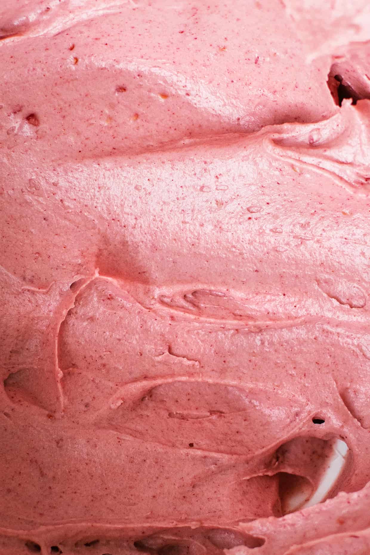 close view of pink raspberry cream cheese filling