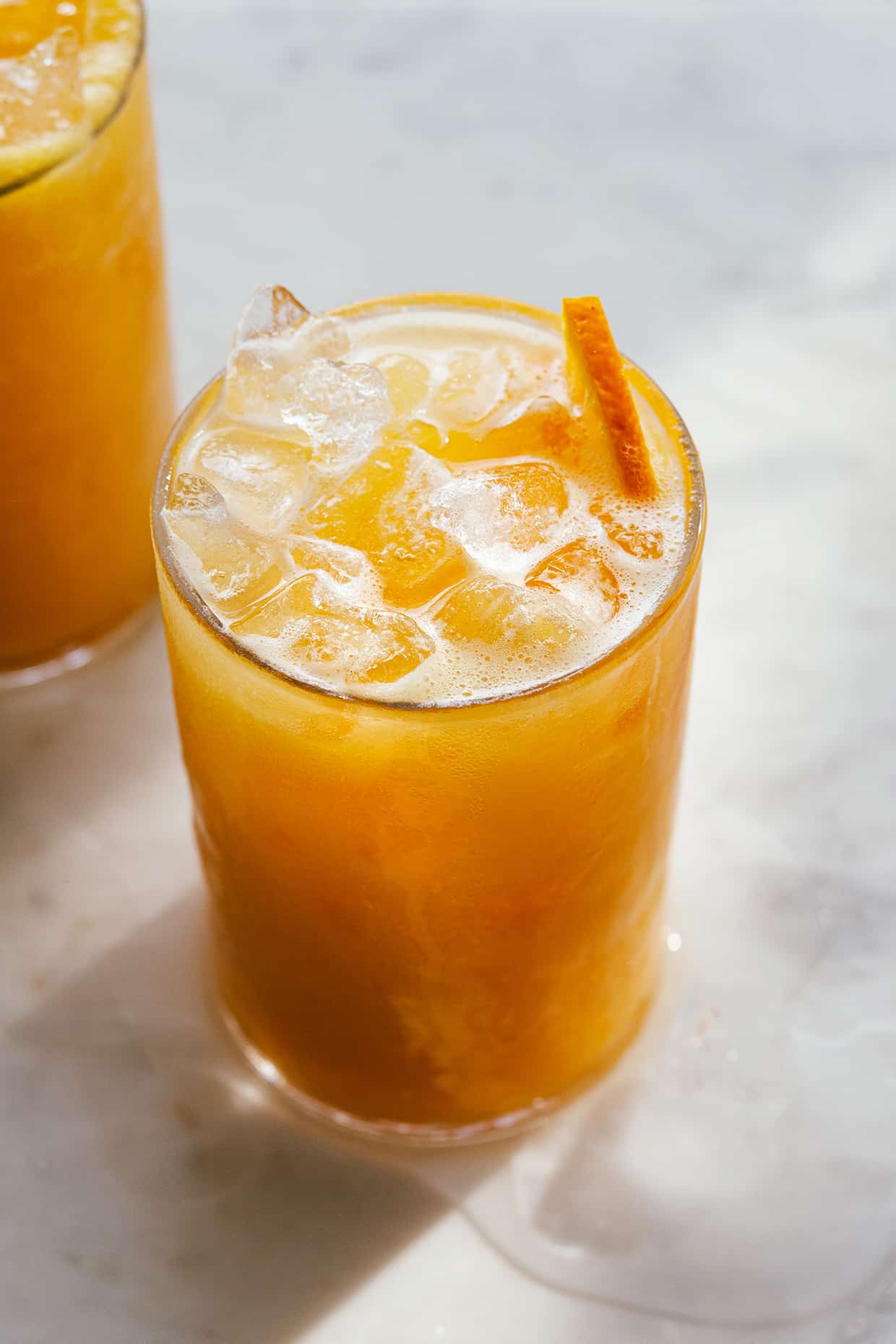 orange juice drink served over ice